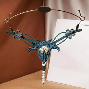 Calcinha com pérolas