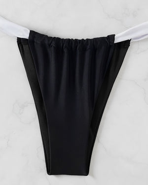 Biquíni Preto com Detalhes Brancos – Sofisticação e Modernidade