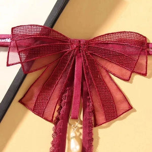 Calcinha Sexy com detalhe em laço e pérolas