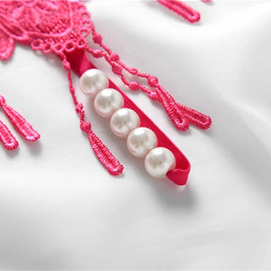 Calcinha com pérolas e franjas