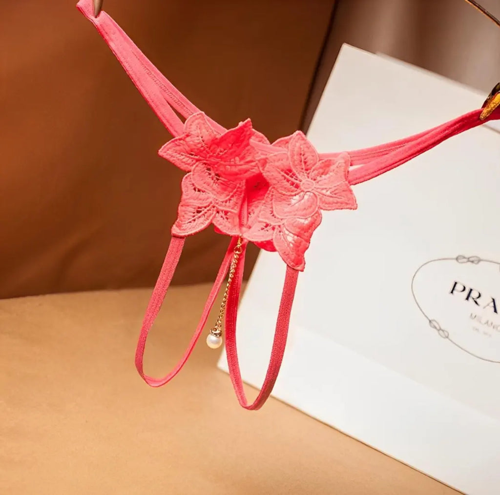 Calcinha com bordado em flor