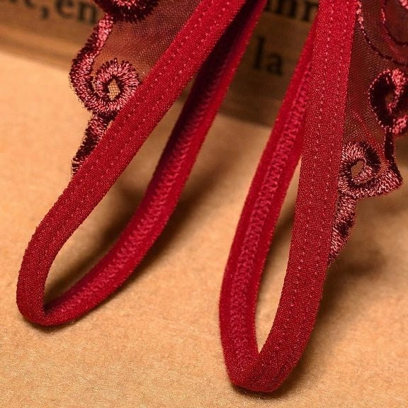 Calcinha fio dental ppreta transparente com detalhe em laço – Lingerie Sensual Feminina P ao GG